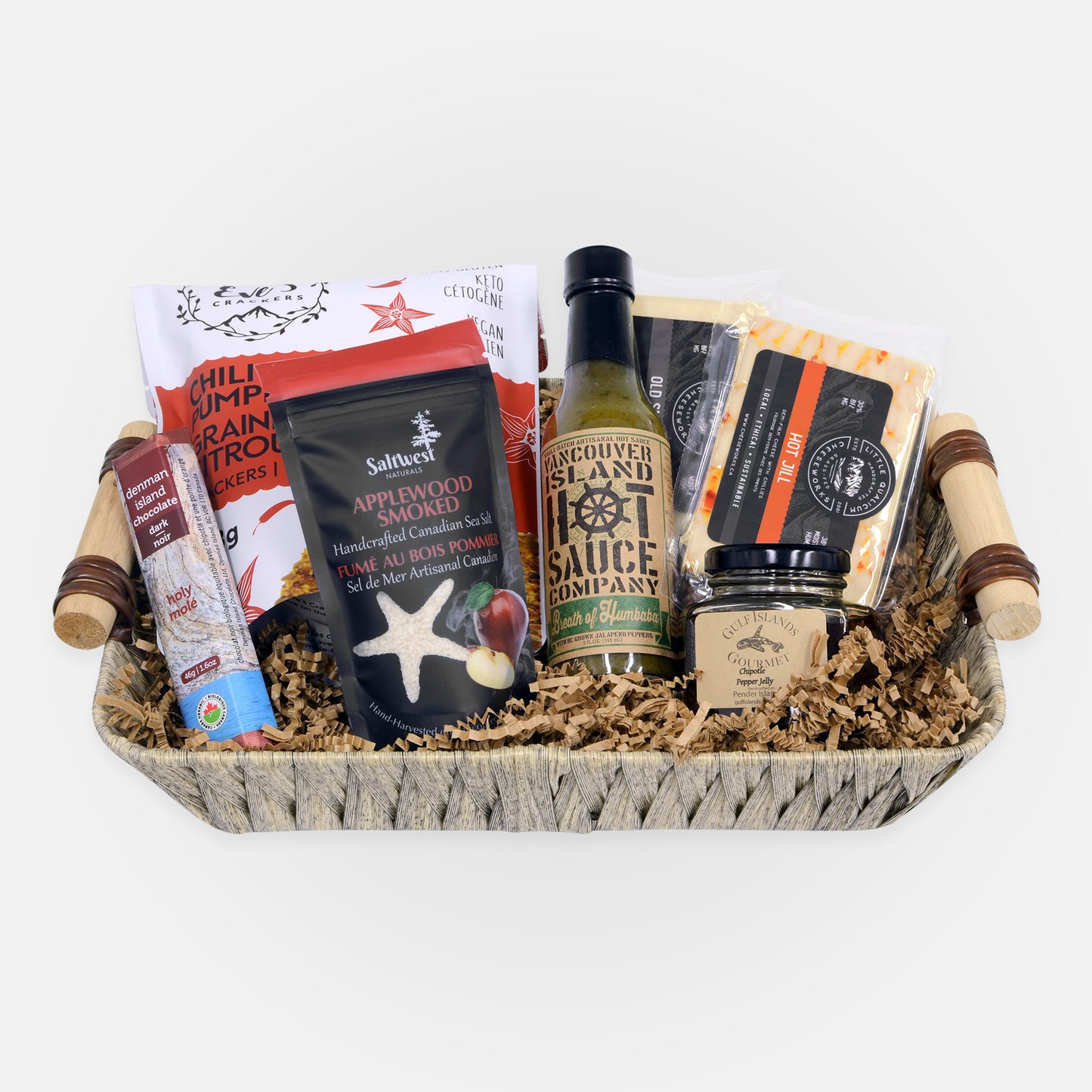 Gift basket with Denman chocolate, Eve's crackers, Saltwest salt, Vancouver Island hot sauce, two cheeses and Gulf Islands Gourmet jelly in basket with handles