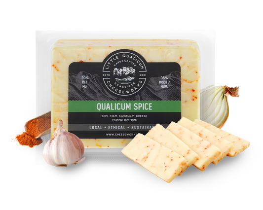 Qualicum Spice in packaging with LQC logo and onion, garlic and paprika surrounding the image with slices of cheese