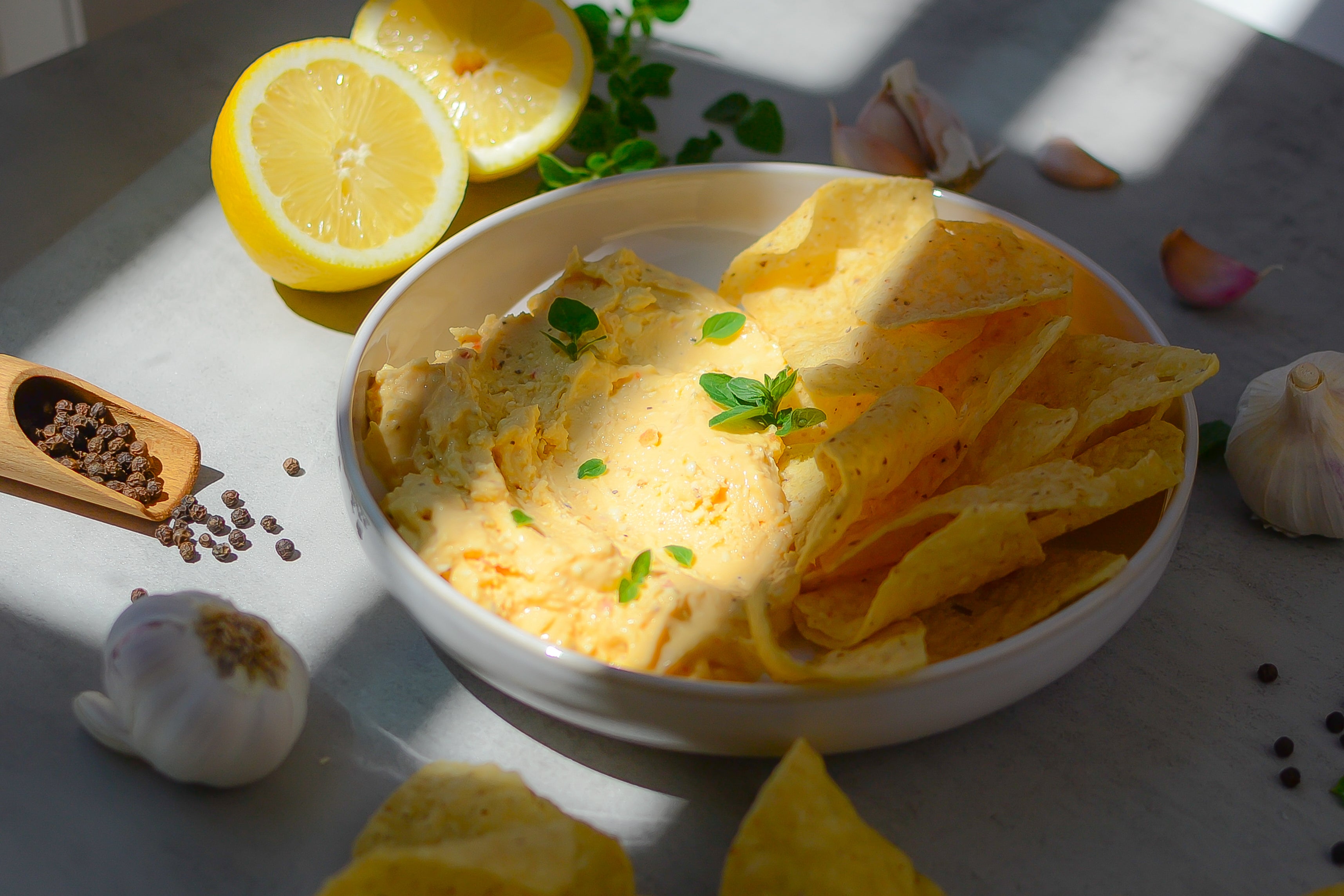 Garlic Pepper Feta Whip is served in a dish with corn chips - one of many suggested servings.