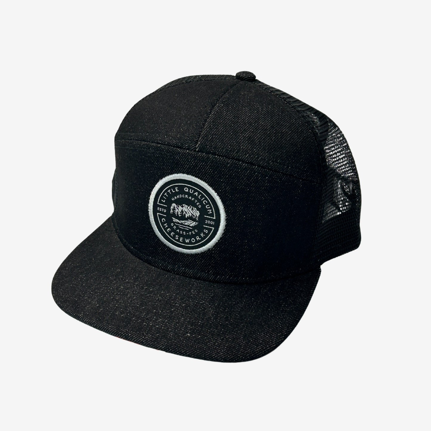 Little Qualicum Cheeseworks woven patch hat from the front. The 7-panel style features a structured black denim front and brim and black mesh sides with snapback closure.