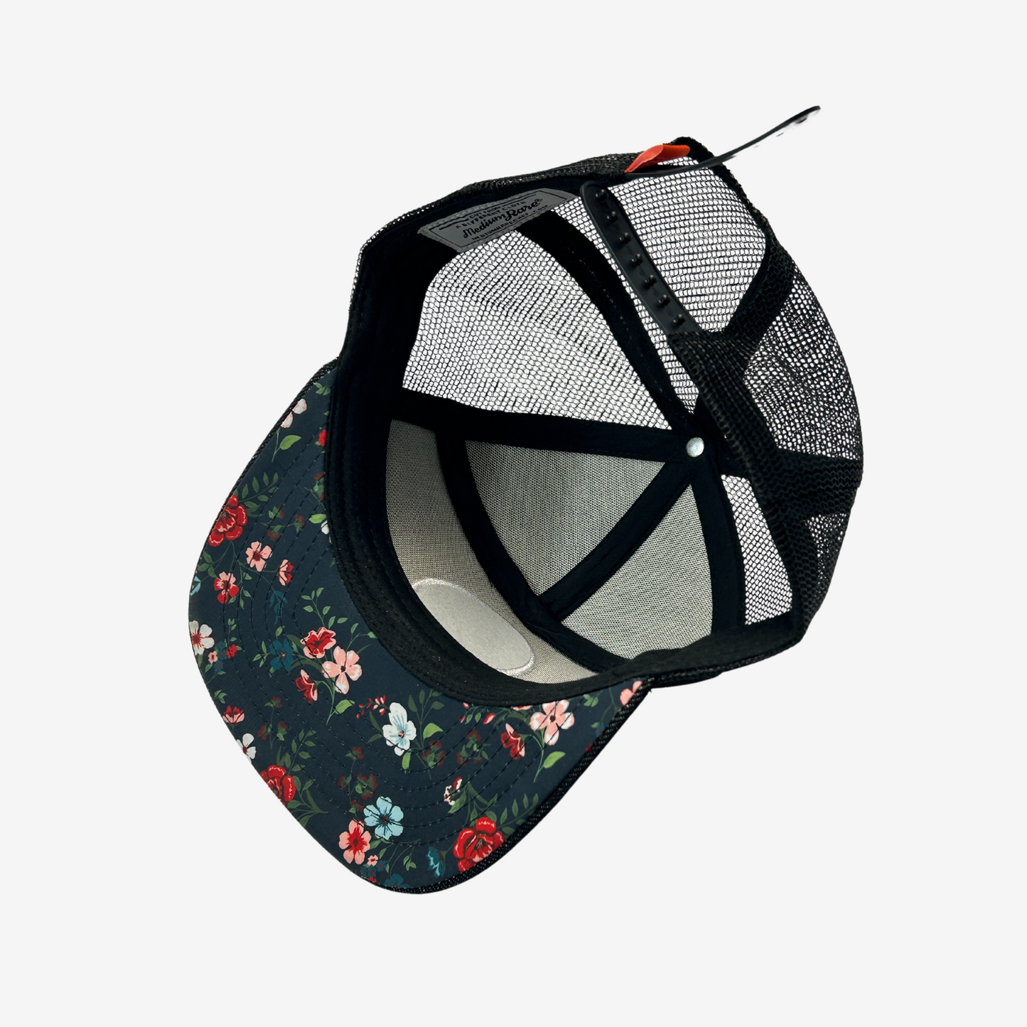 View of Little Qualicum Cheeseworks hat from below, showing floral patterned fabric under the brim.