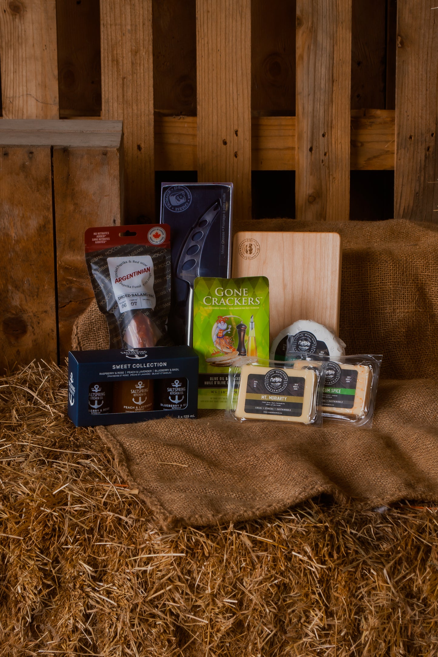 Assorted local BC food products on a rustic wooden background