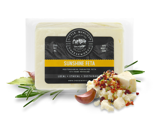 Sunshine feta in packaging with cheese and herbs