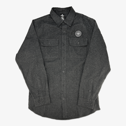 Dark gray flannel shirt with Little Qualicum Cheeseworks'  logo on a white background